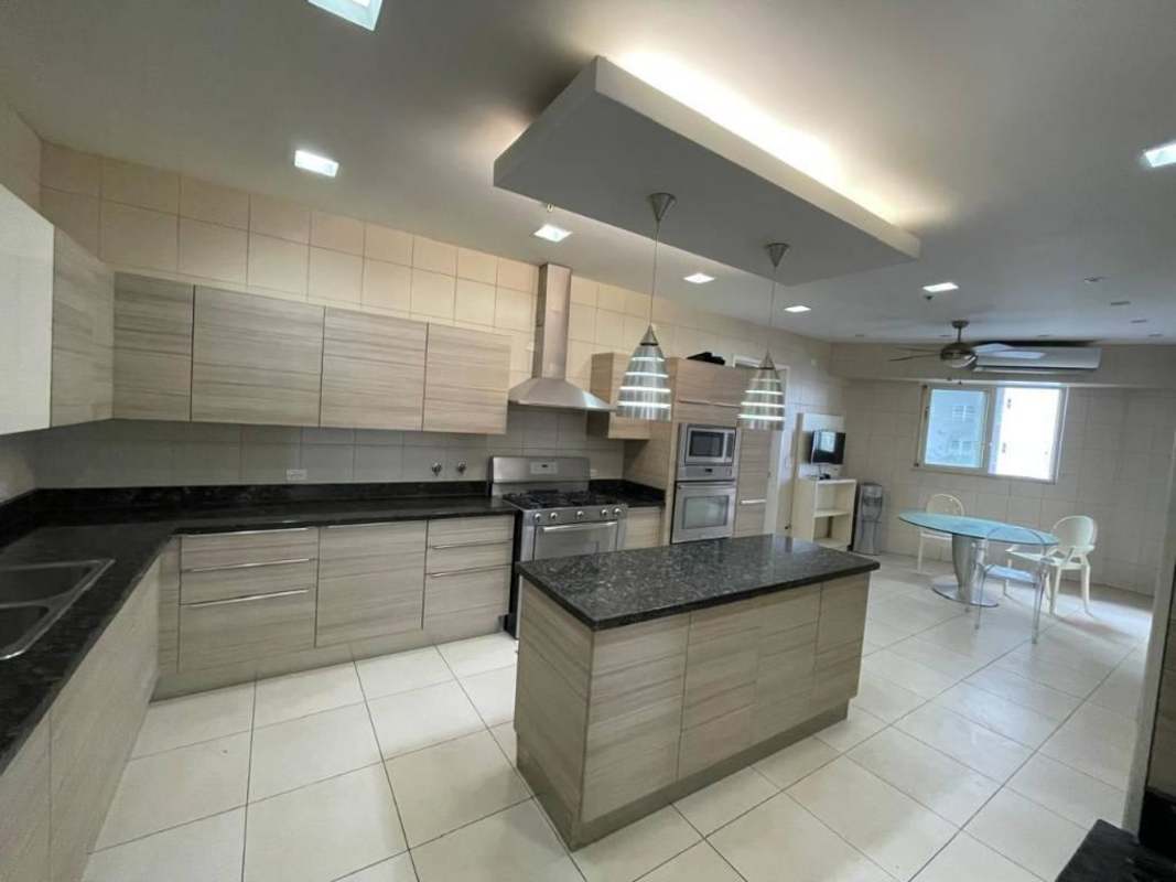 Spacious kitchen with granite counters, stainless appliances in PH D1 Punta Paitilla Panama