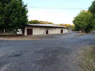 Utility warehouse exterior with multiple access bays in Canto del Llano Santiago de Veraguas Panama
