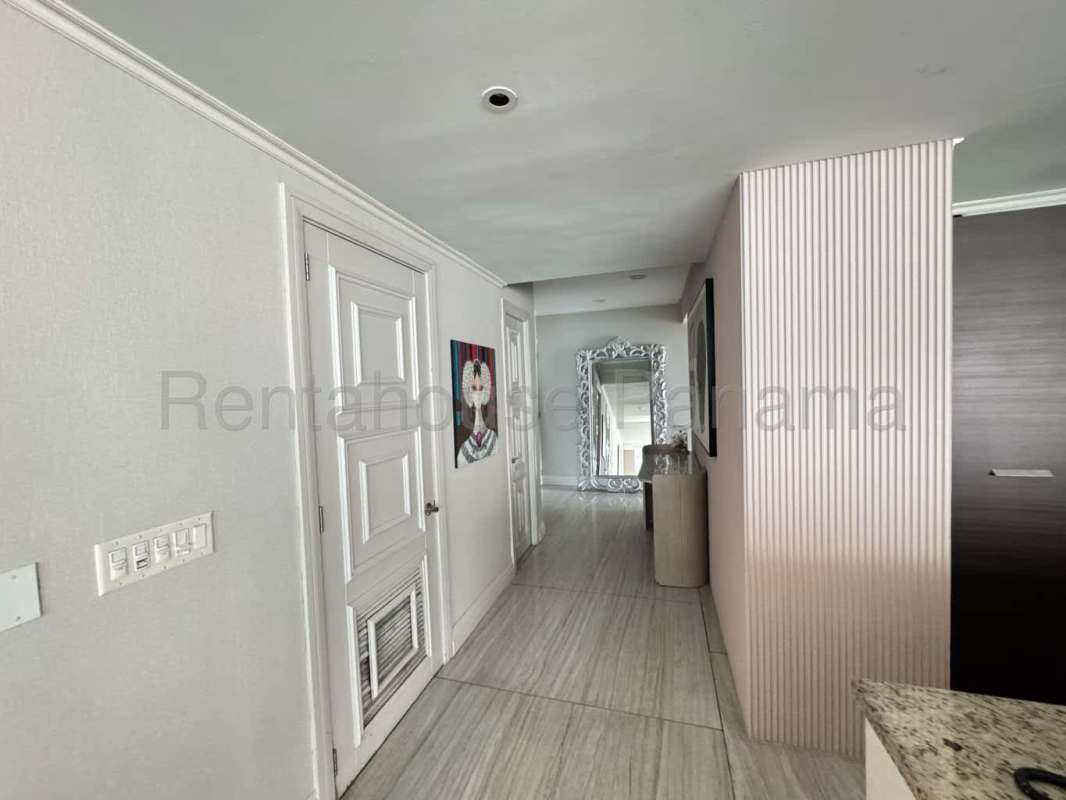 Secondary bedroom with marble floors & city views in PH Oceanaire Punta Pacifica luxurious apartment