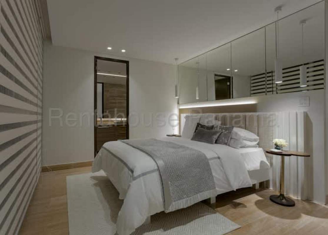 Bedroom with accent wall, pendant lights, modern design in The Regent Costa del Este Panama