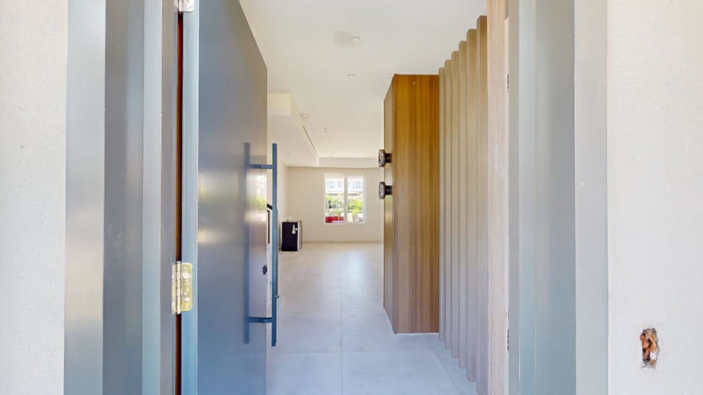 Modern open living room with marble floors and ceiling windows rental Santa Maria Panama