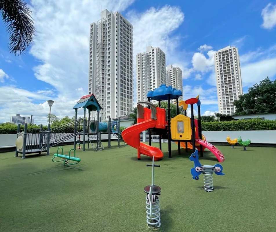 Children's playground with colorful slides at PH Rokas Pedregal Panama rental property