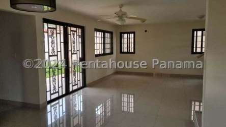 Kitchen with granite counters and black cabinetry for rent house Costa Verde Panama