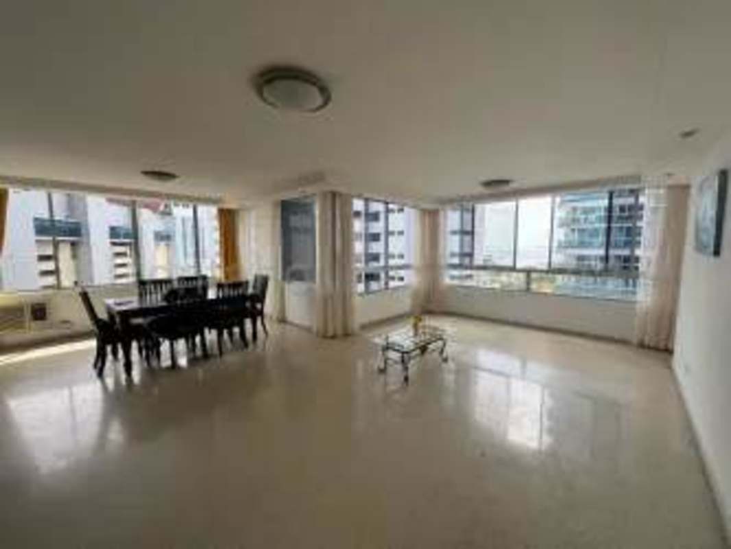 Furnished bedroom with large windows facing Pacific Ocean in PH Bahia Marbella Panama City