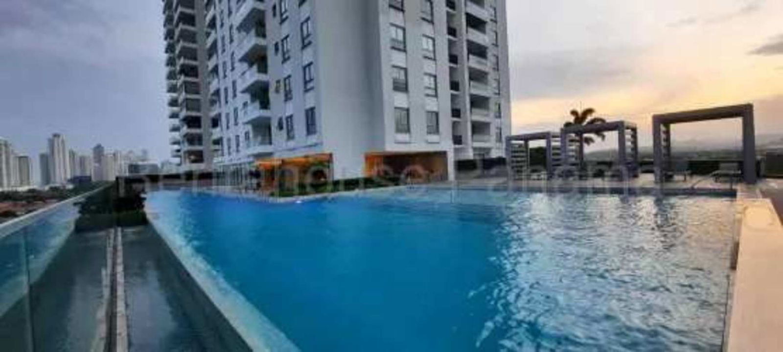 Infinity swimming pool overlooking Panama skyline at Sky Residence Santa Maria