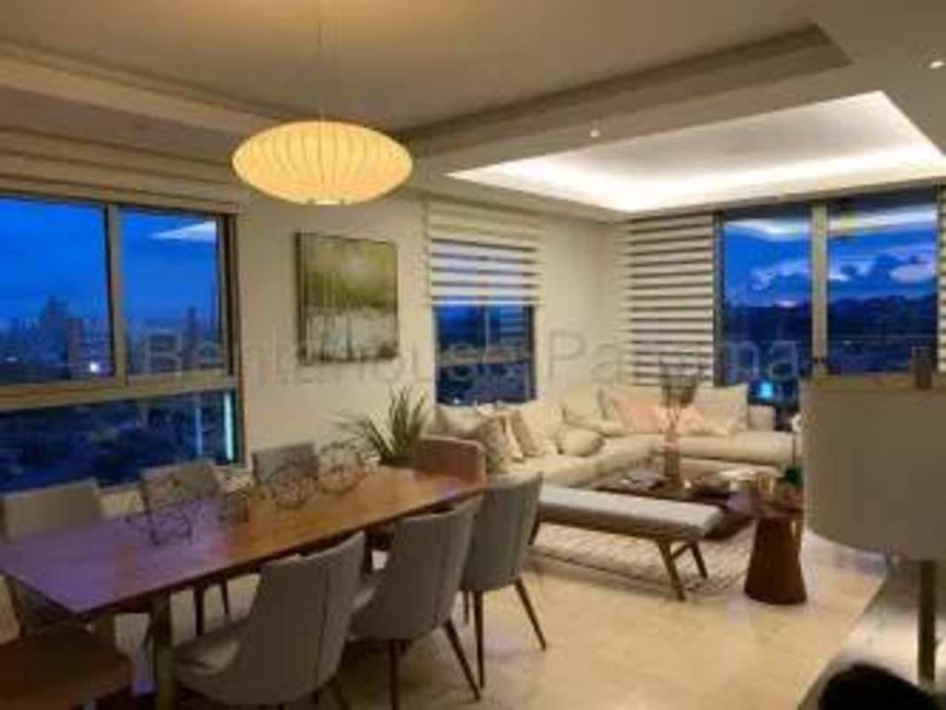 Modern living dining room open plan with large windows and city view Sky Residence Panama