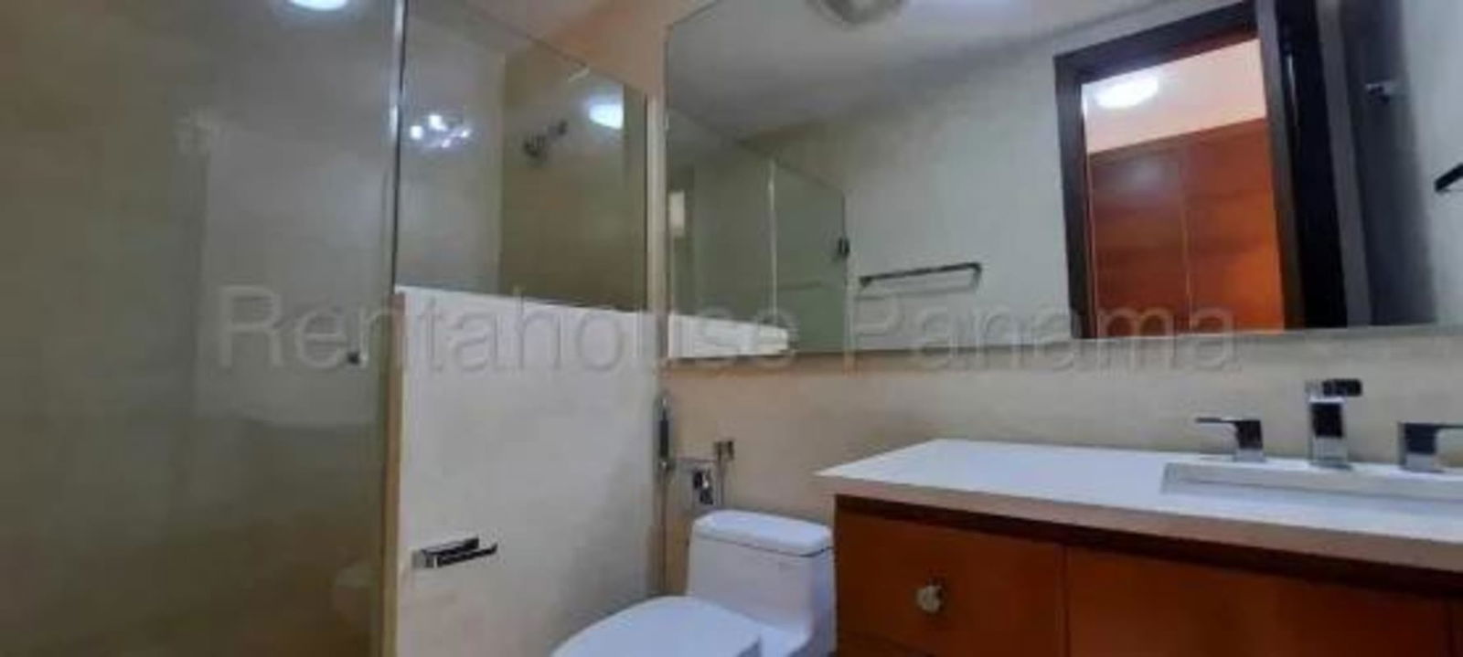 Luxury bathroom with double sinks, marble counter, large mirror in Santa Maria Panama