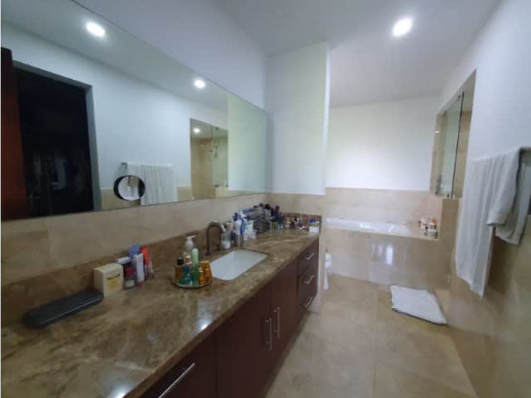 Spacious bedroom sliding glass doors to garden modern finishes Santa Maria