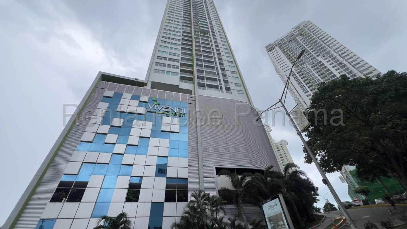 Furnished dining and living area with balcony at PH Vivendi Green Edison Park Panama City