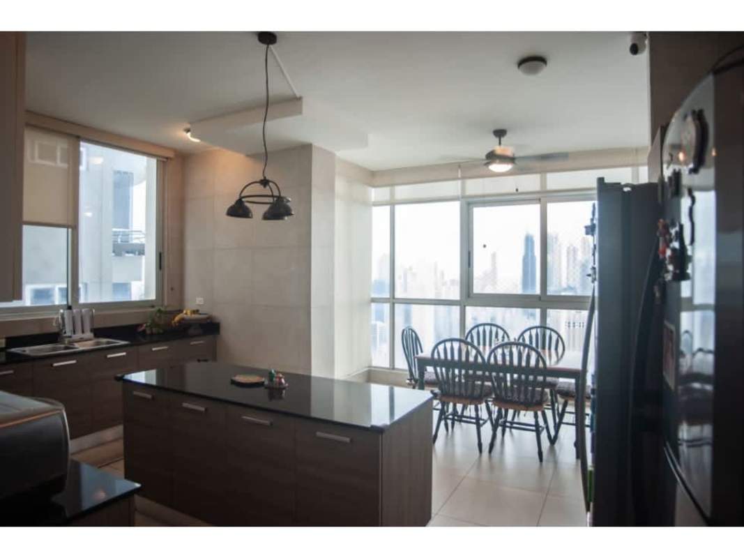 Open plan dining area with ceiling fan and panoramic view in PH Luxor Panama City