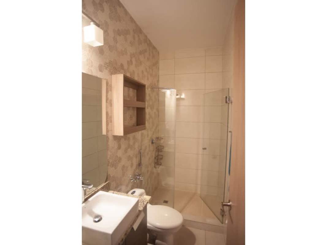 Contemporary lobby with murals, lighting, and reception PH Luxor Panama City