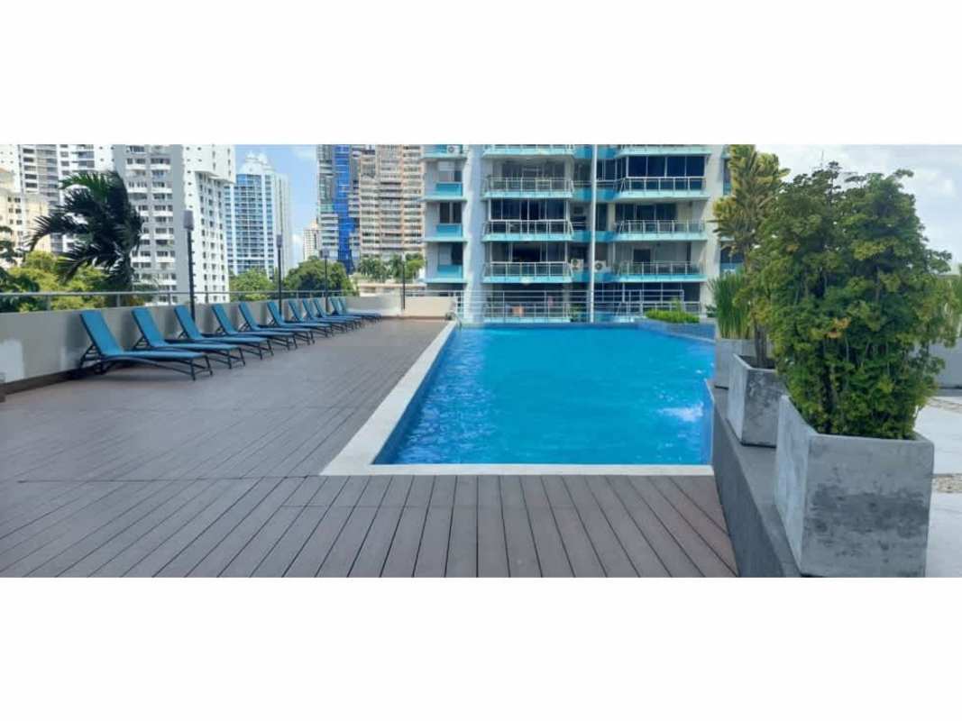 Game room with sofas, TV, and foosball table in PH Luxor Panama