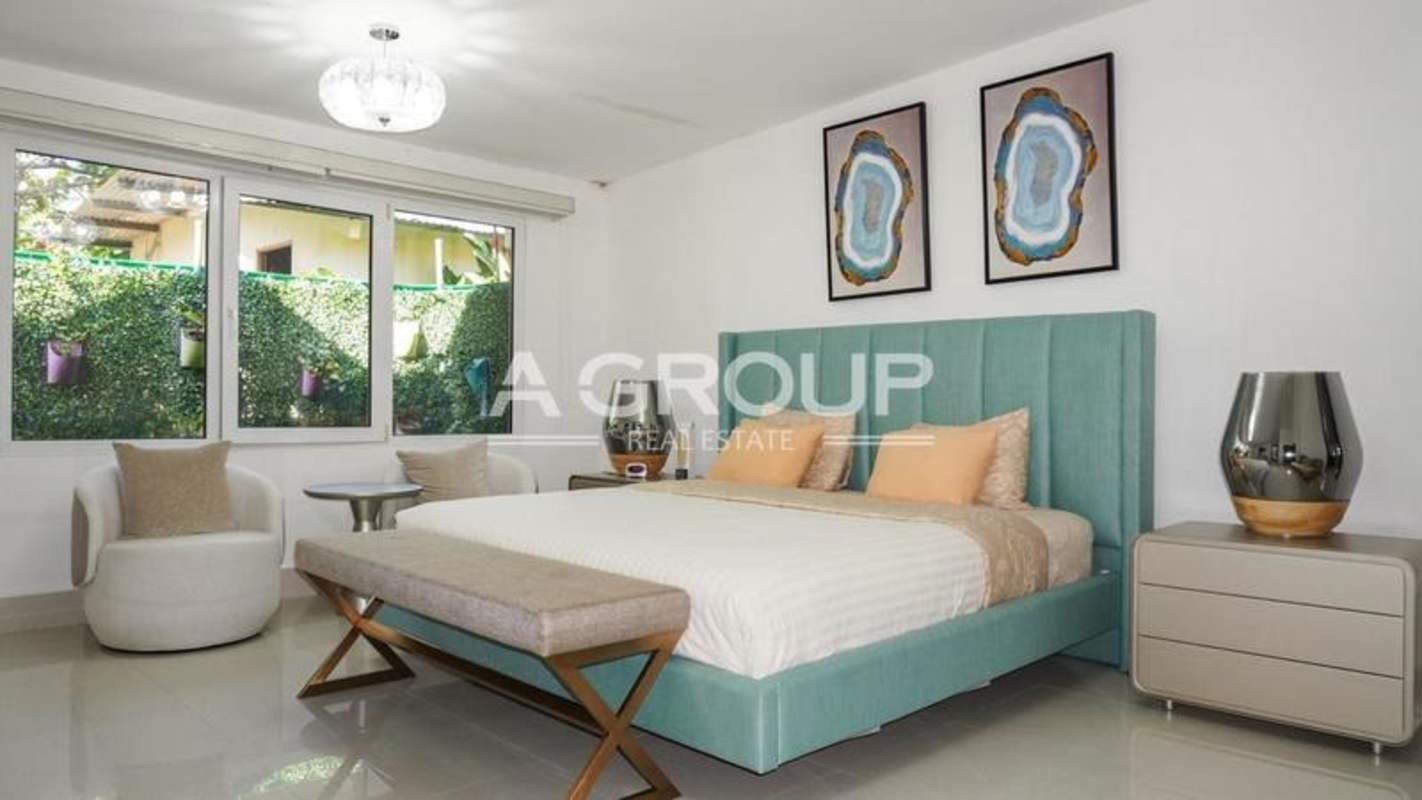 Master bedroom suite with view of lush greenery luxury beachfront estate Panama