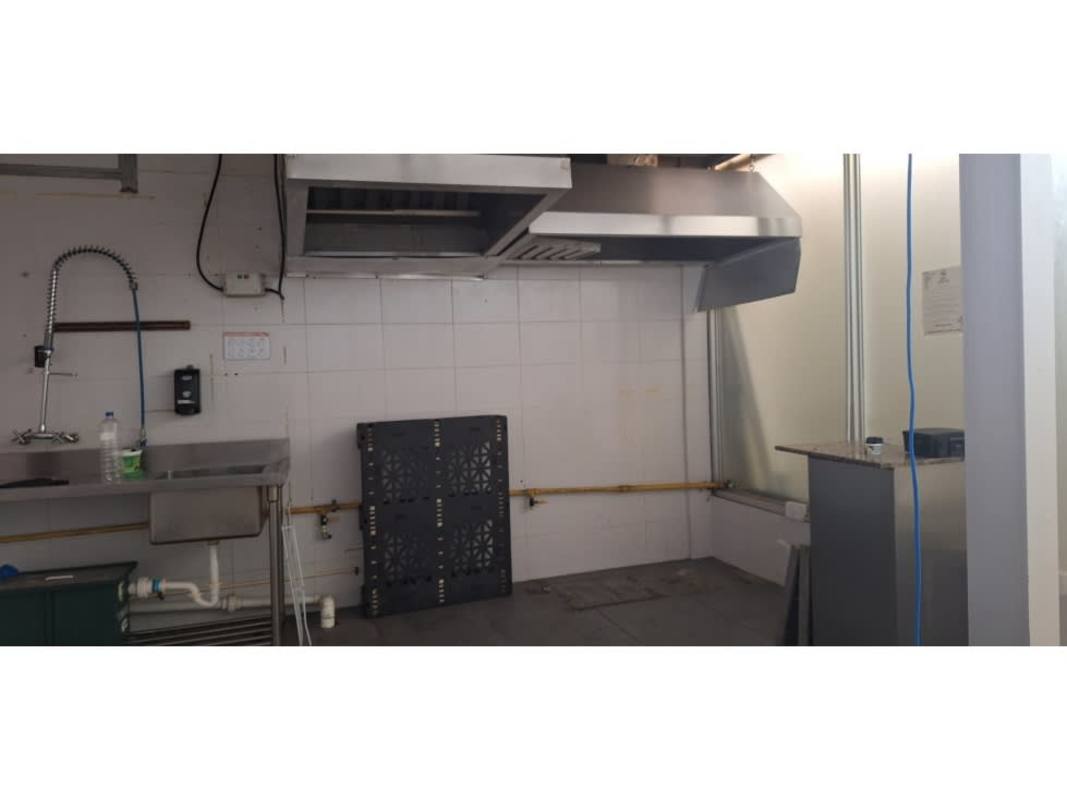 Interior hallway with frosted glass partition security camera tiled floor San Francisco Panama