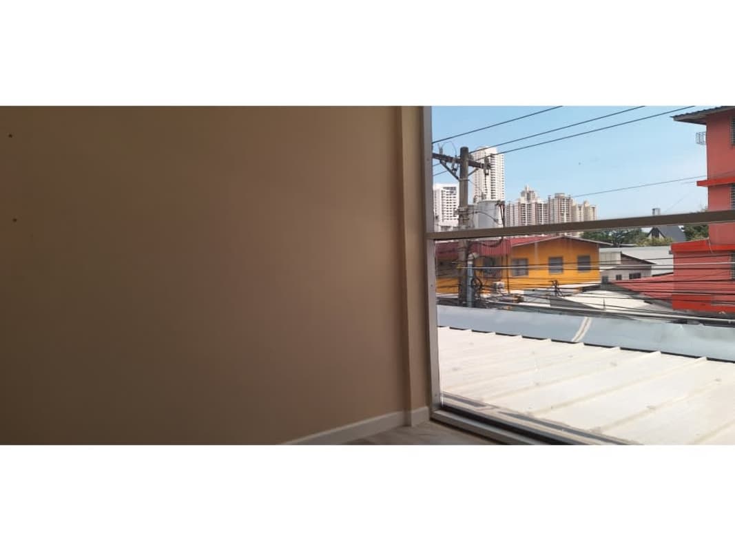 Inside view large window overlooking city urban skyline commercial space San Francisco Panama