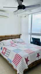 Bathroom with walk-in shower and granite vanity in PH Coronado Bay