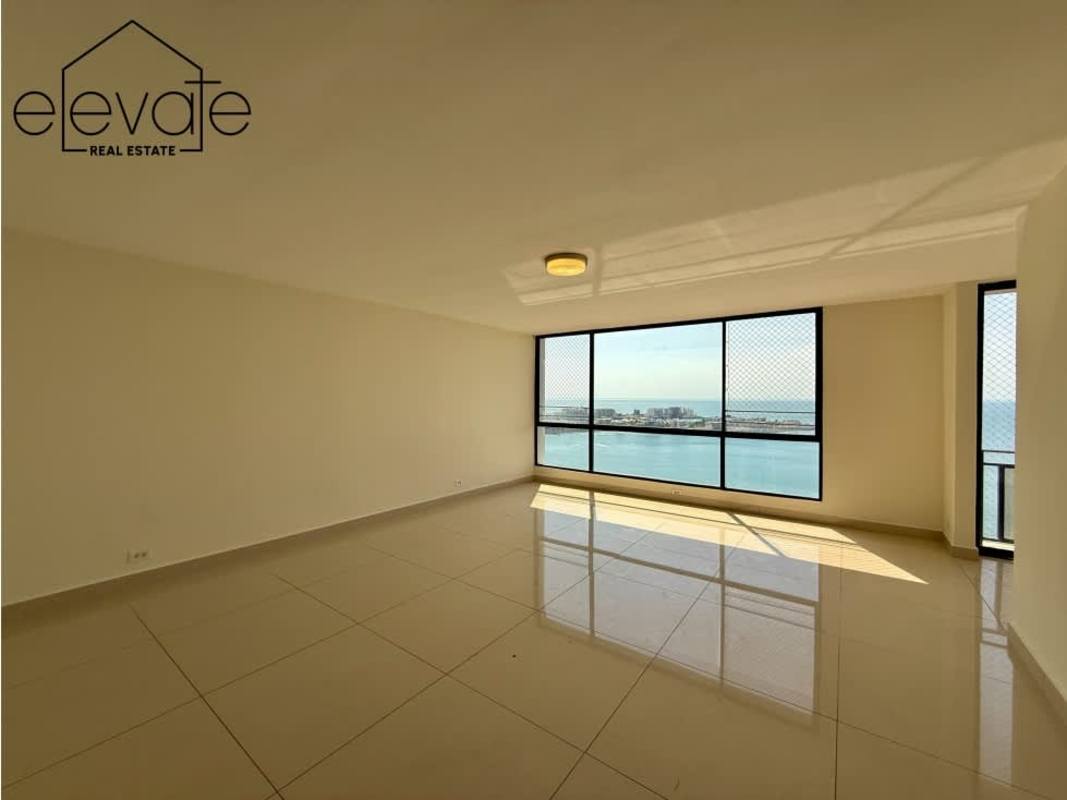 Enclosed glass balcony with safety netting and panoramic sea views at PH Winston Churchill Punta Paitilla Panama City