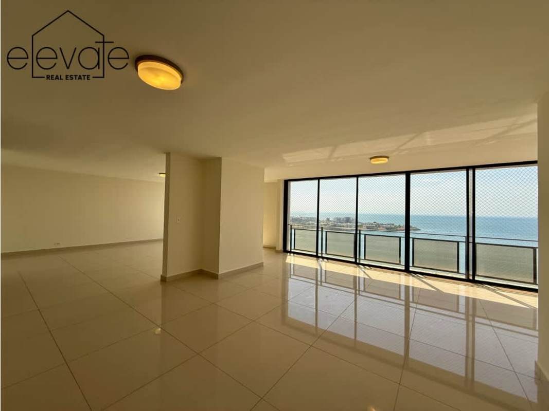 Living area with panoramic ocean views, floor-to-ceiling windows at PH Winston Churchill Punta Paitilla Panama City