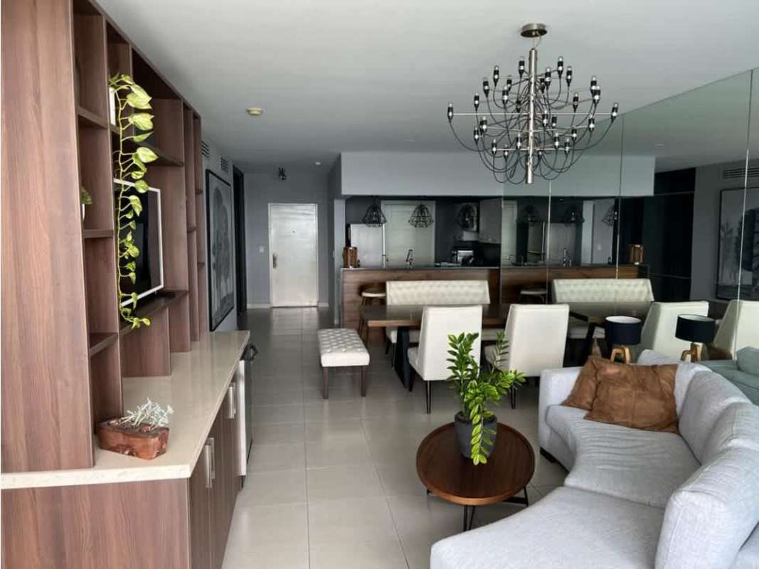 Living room with large windows ocean skyline views PH The Waters Avenida Balboa Panama