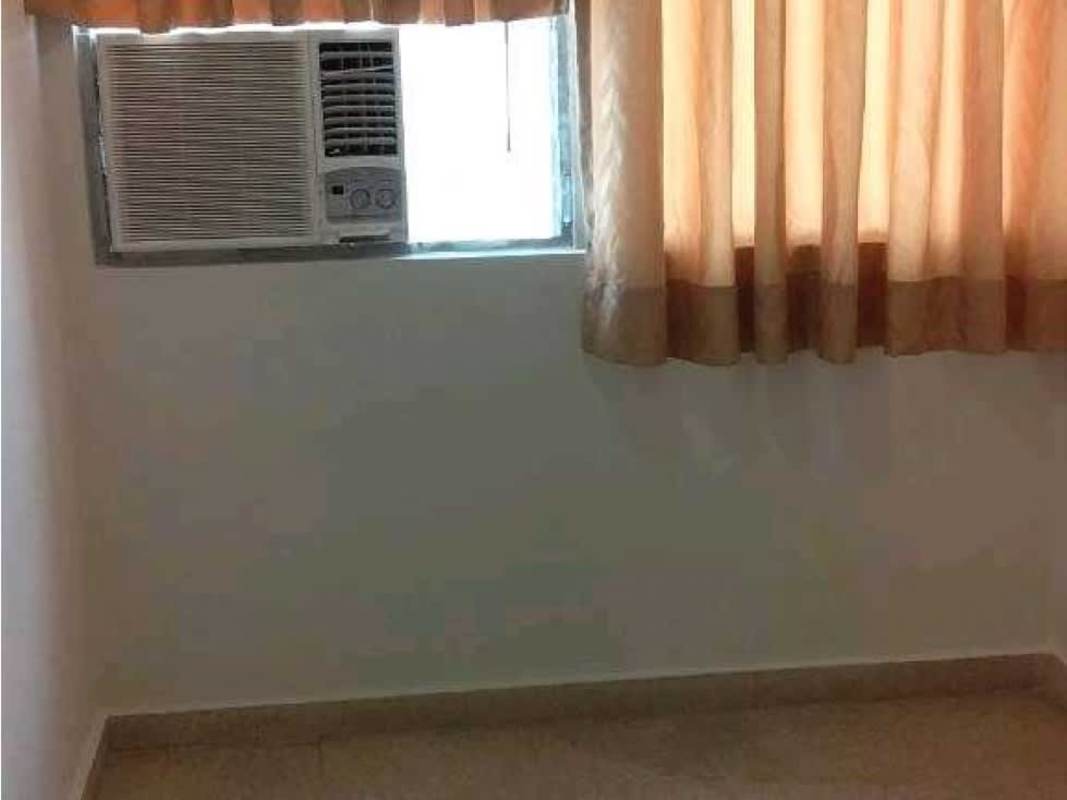 Bedroom with split AC and fan light blue walls Panama apartment sale