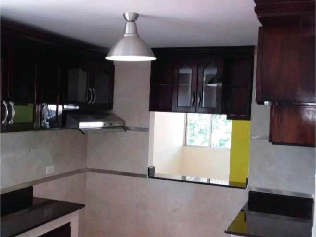 Bedroom with purple wall decals and ceiling fan Panama City apartment