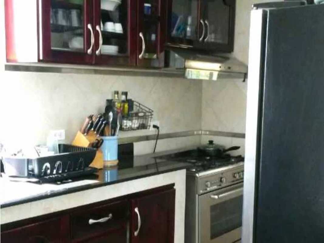 Entrance hall with brick accent and recessed lighting Panama apartment