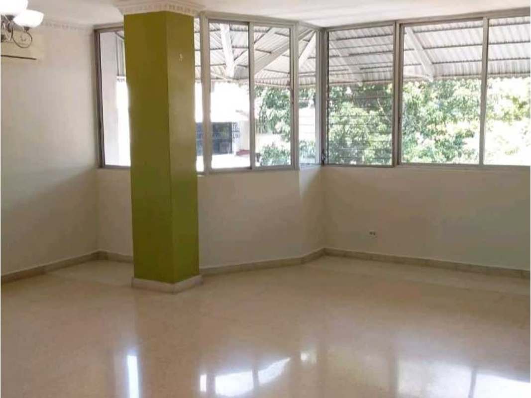 Bedroom with lavender walls, floating shelves, ceiling fan in PH Hato Pintado Panama City