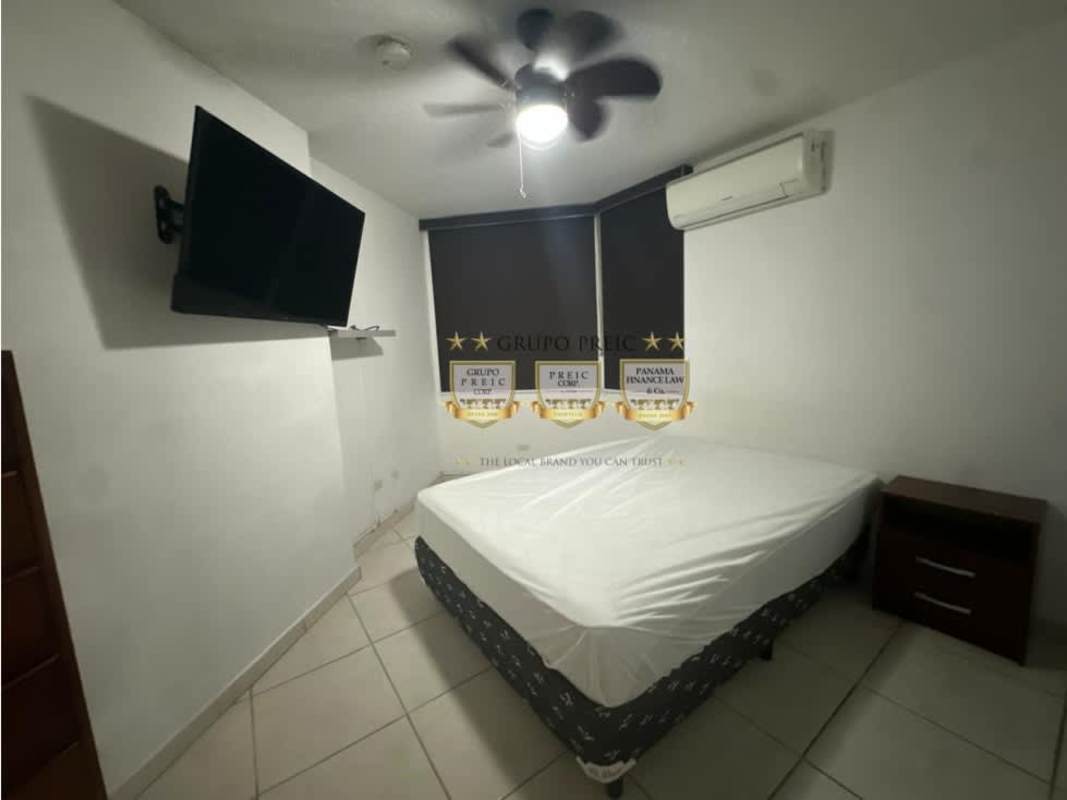 Outdoor swimming pool and lounge area at PH Residencial Llano Bonito Panama City