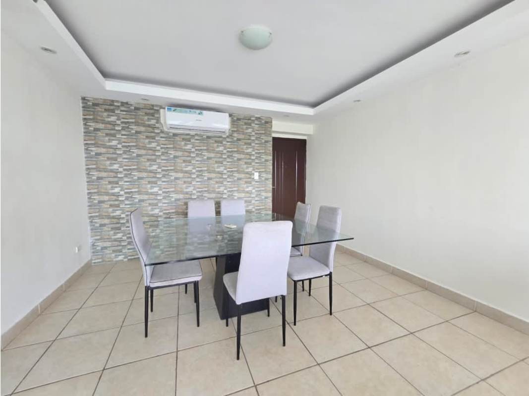 Swimming pool area with lounge chairs and greenery in PH Clayton Park I Clayton Panama