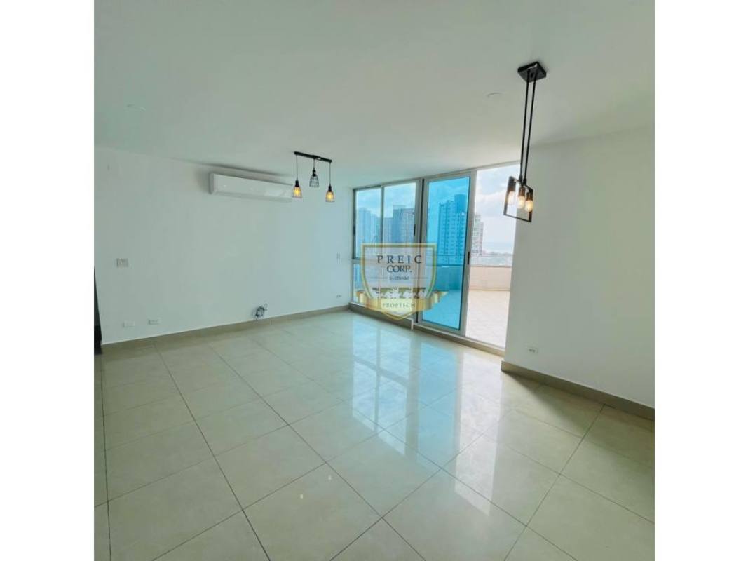 Bedroom with large window and city view in Kolosal Tower Panama City