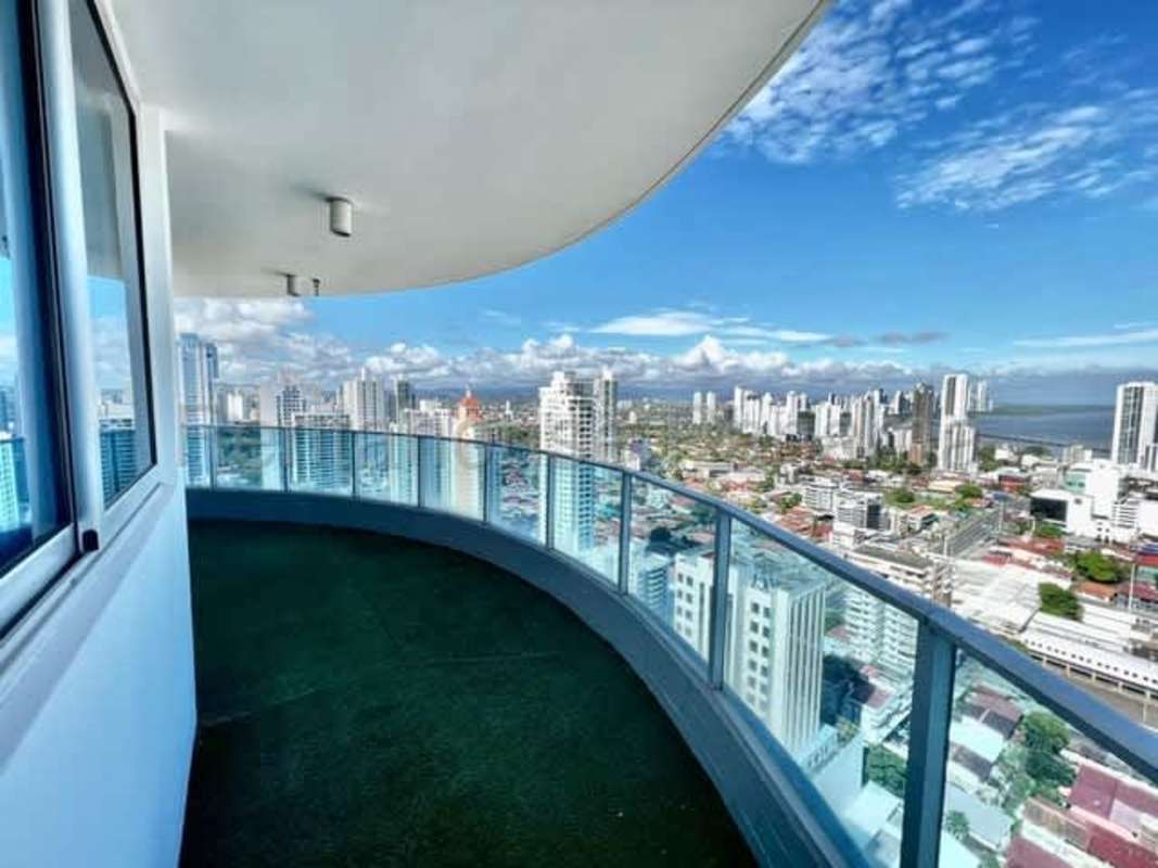 Luxury bathroom with glass-enclosed shower and porcelain tiles in PH Joy Tower San Francisco Panama