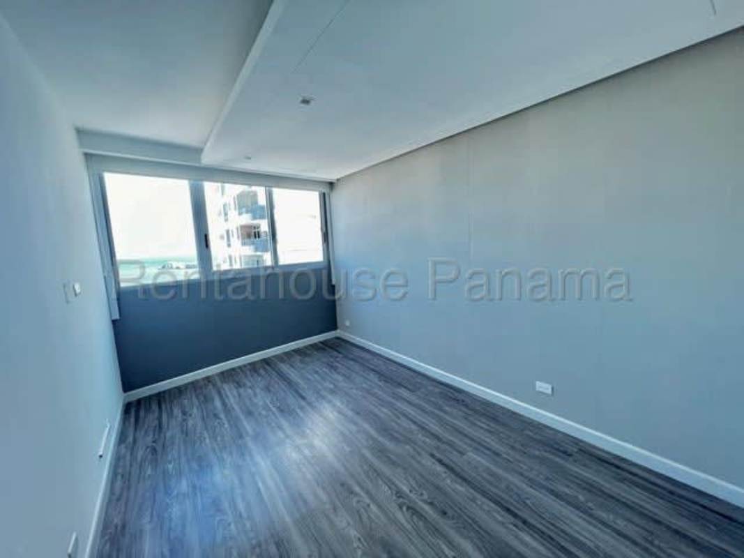Elegant bathroom with porcelain tile and glass-enclosed shower PH Joy Tower San Francisco Panama