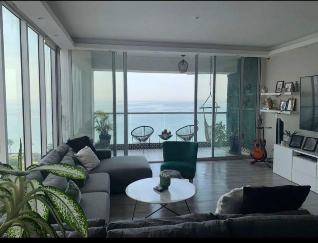 Open dining space with skyline views in PH Rivage Tower high-rise apartment