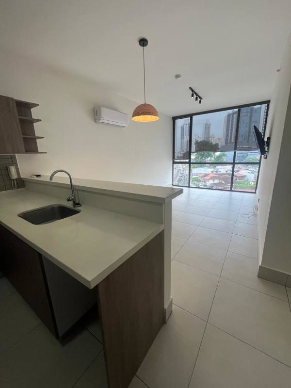 Modern open kitchen with breakfast bar and appliances PH Coco Place Coco del Mar Panama City