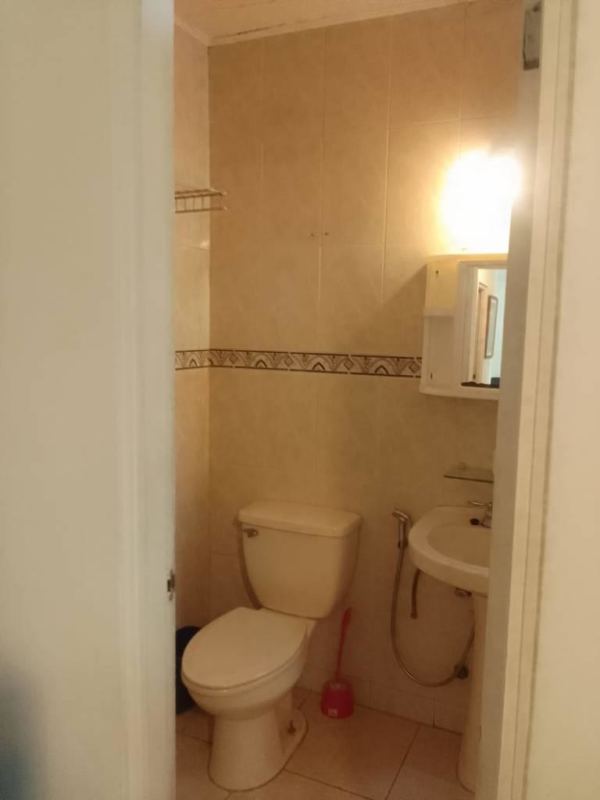 Glass enclosed balcony with tile flooring and city view PH Marina Plaza Panama