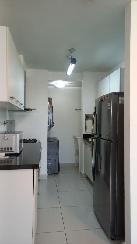 Laundry room with utility sink water heater porcelain tile PH San Francisco Bay Panama City