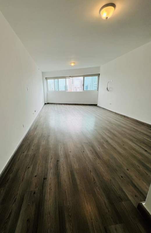 Modern white kitchen with granite countertops, appliances, porcelain tile floors PH San Francisco Bay Panama City