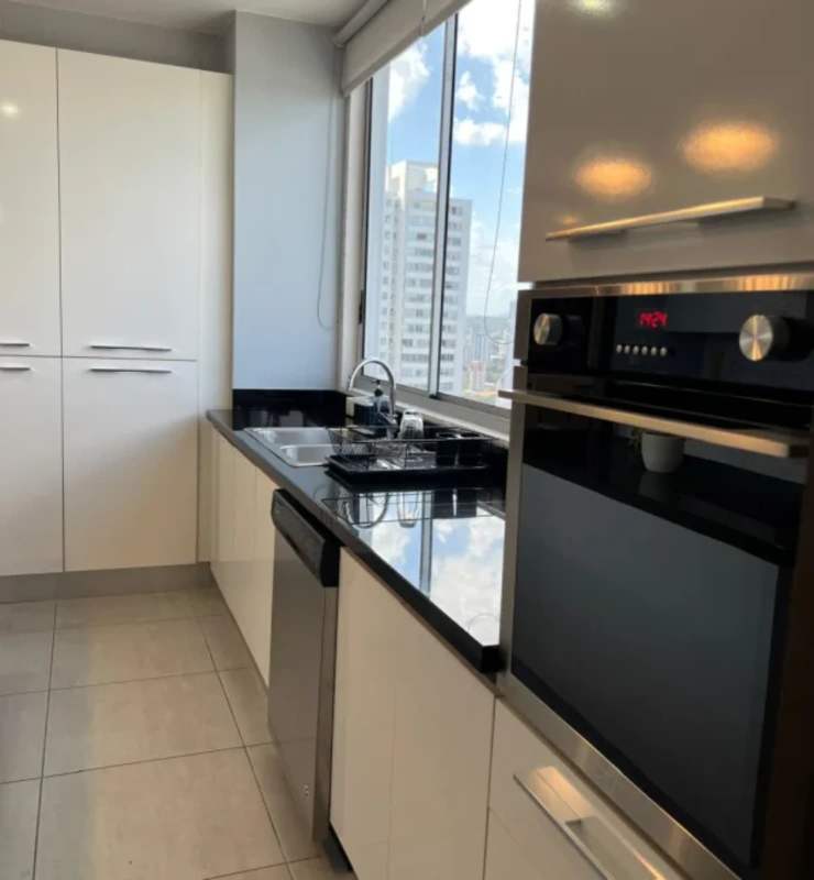 Spacious master bedroom with large window, tile floors, closet, city view in Jade Tower Panama