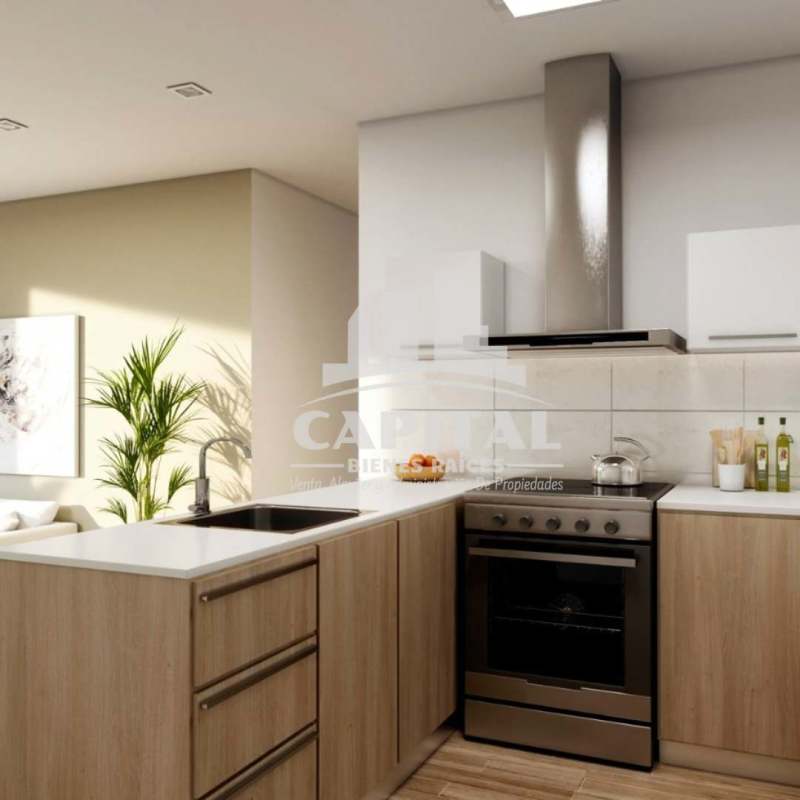 Modern kitchen with wood cabinetry and stainless steel appliances at PH The Balcony Panama