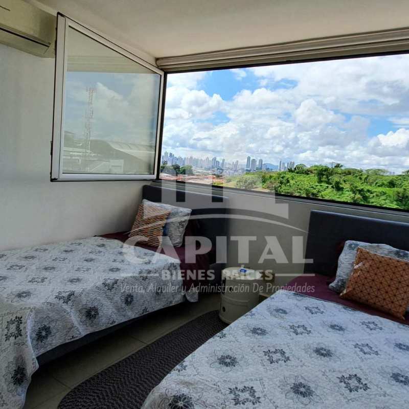 Open concept kitchen with granite counters washer-dryer unit PH 4 Islas Panama City