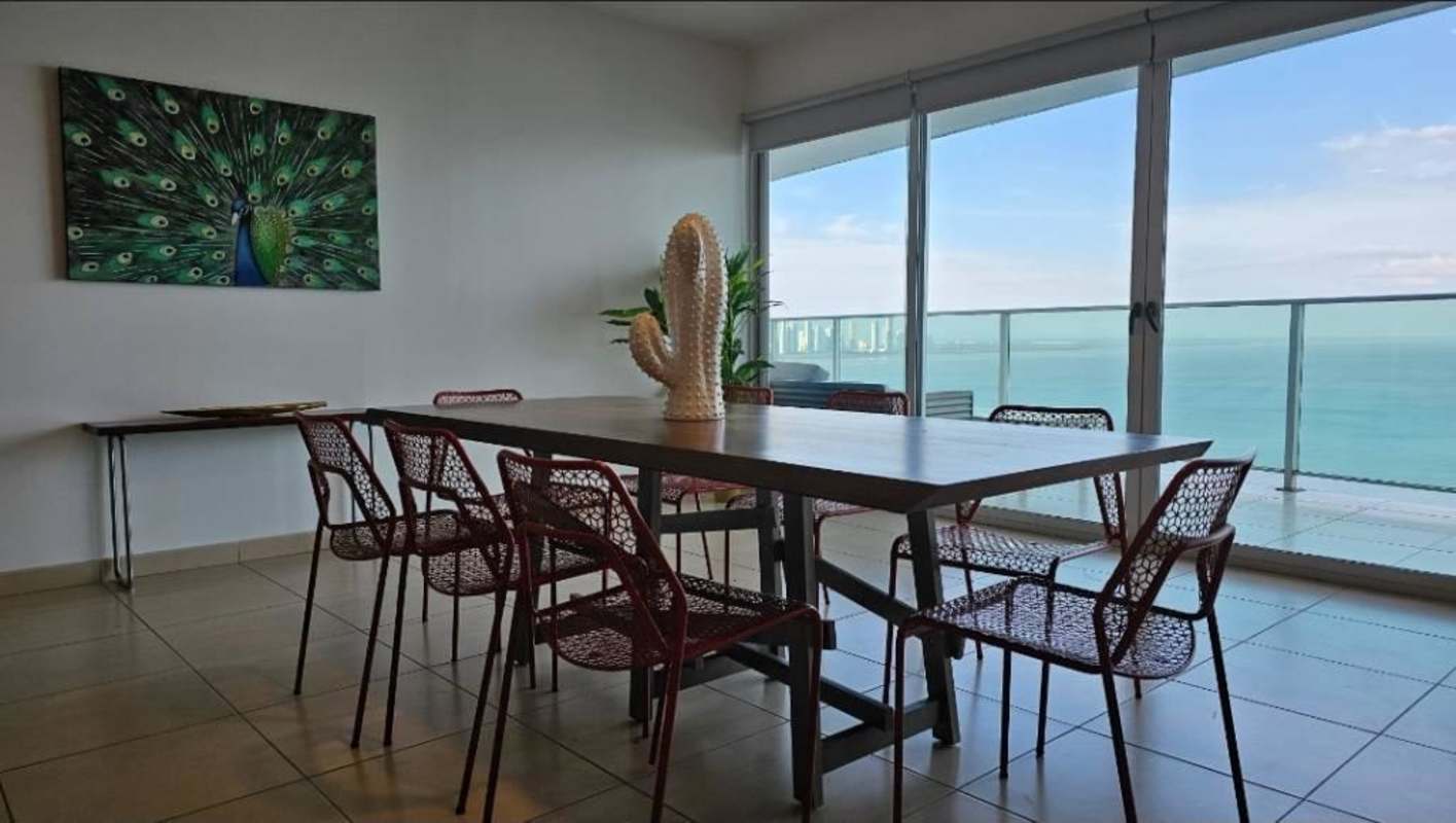Wood cabinetry kitchen with granite counters, stainless appliances, ocean view windows Punta Pacifica