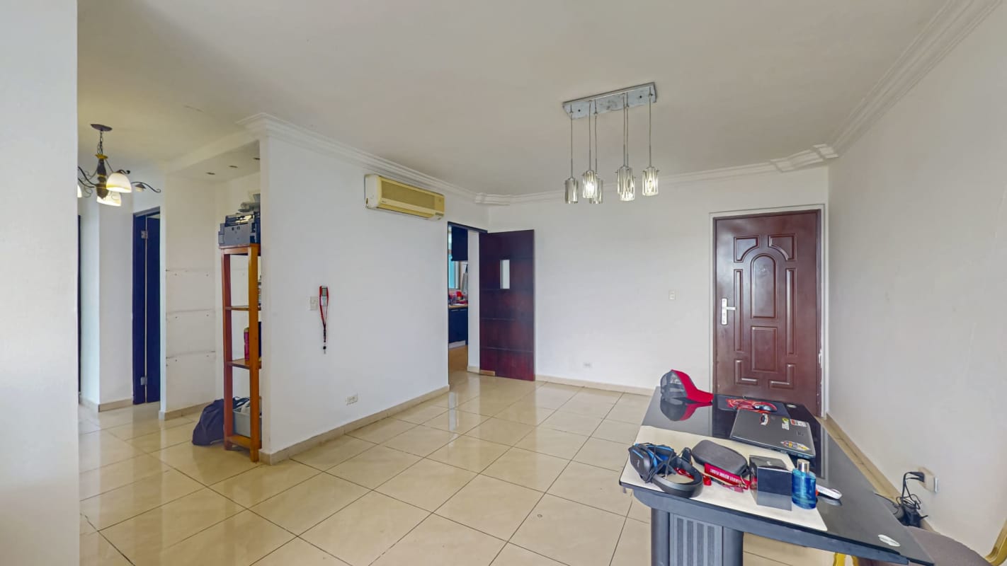 Covered apartment balcony with railing and urban view PH Crystal Hills Panama City