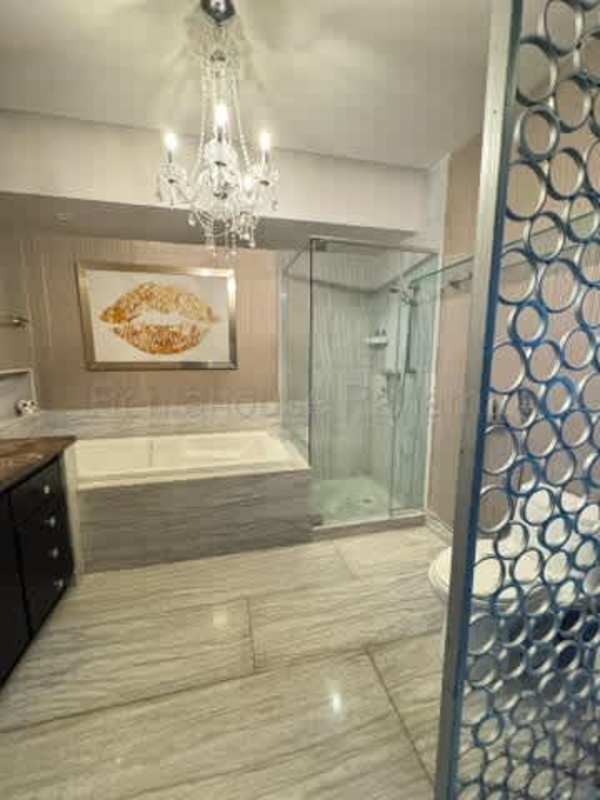 Luxury master bedroom ocean views walk-in closet marble floor PH Oceanaire Panama