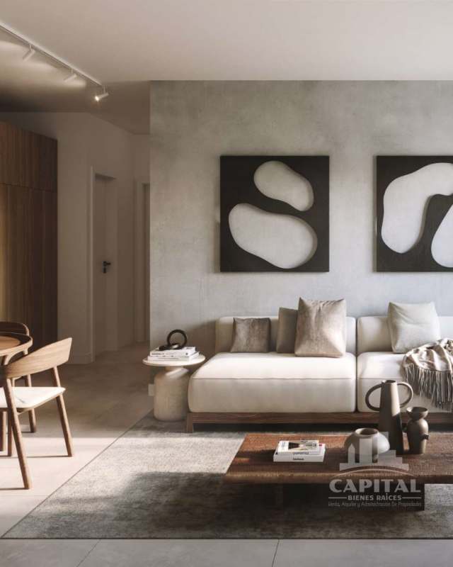 Modern living room with sectional sofa neutral tones large windows El Cangrejo PH Terrano