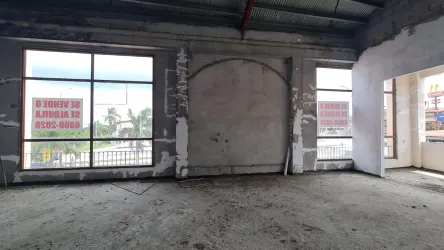 Facade with arches, columns and retail units at The Village Coronado Panama