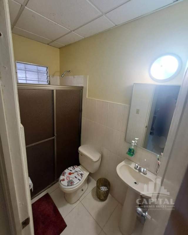 Traditional small bathroom glass enclosure Altos de la Castellana Panama