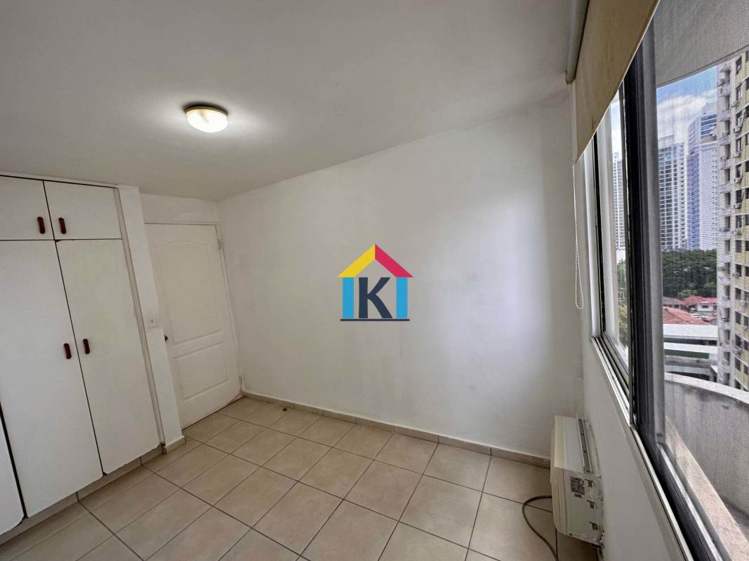 Bedroom with large window, city and ocean view PH Torres Mar del Sur Panama