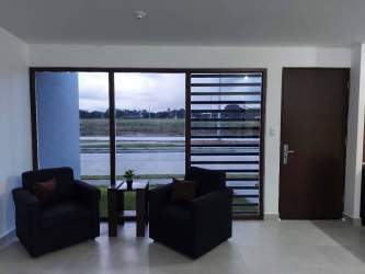 Contemporary bathroom with bathtub and tile finish at Senderos Santa Monica Panama