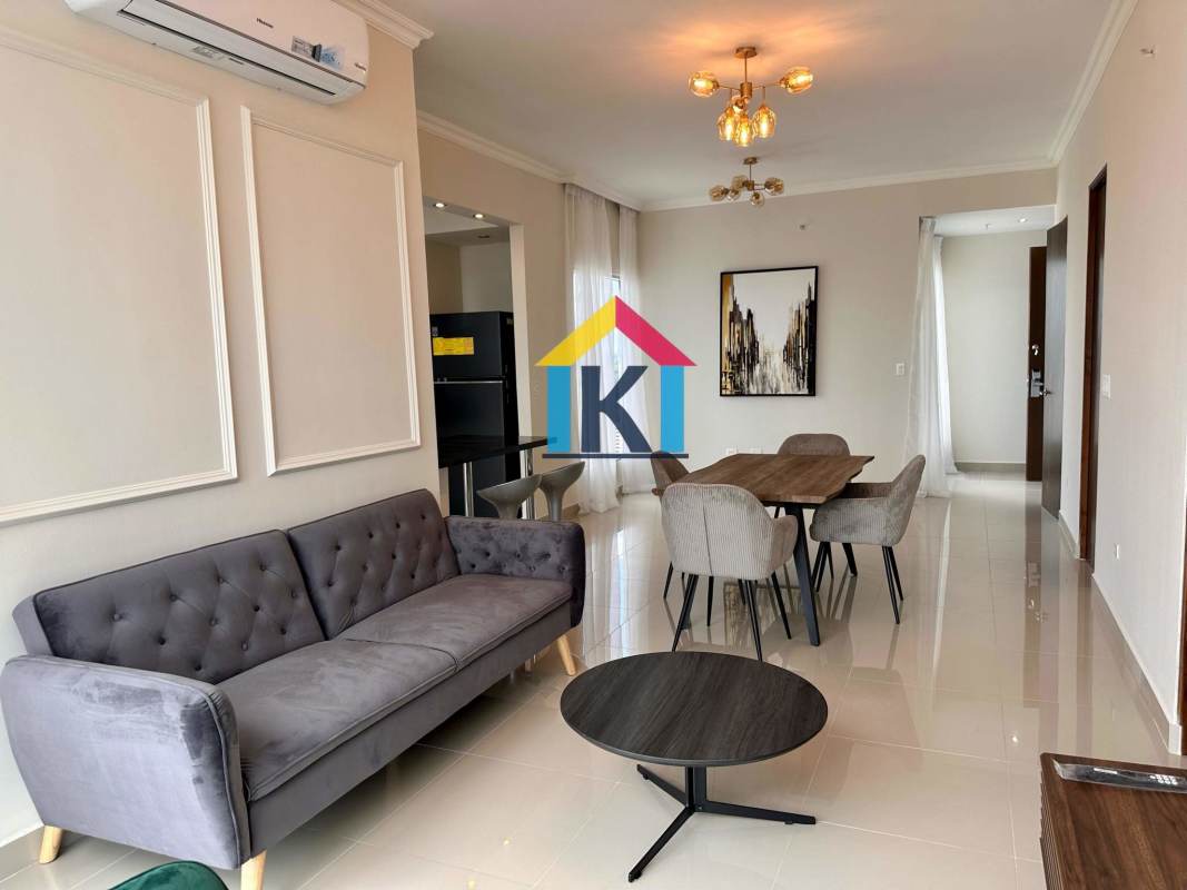 Modern kitchen with quartz counters, open shelving, and appliances in PH Denovo Obarrio