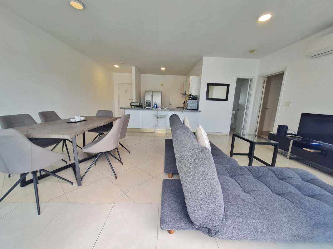 Bright furnished master bedroom with walk-in closet and large window, PH Waters Avenida Balboa Panama City